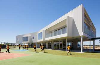 Lysaght custom orb walling at St Claires primary school - colorbond steel cladding - by roam architects