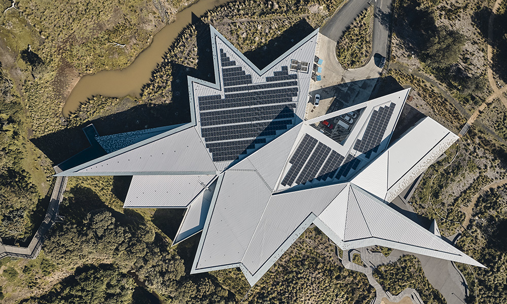 Penguin Parade Visitor Centre featuring roofing made from COLORBOND Ultra steel in the colour Cosmic aerial roof view