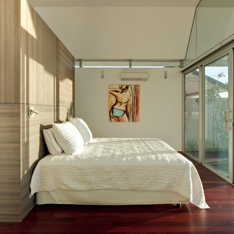 The master bedroom holds views towards the ocean.