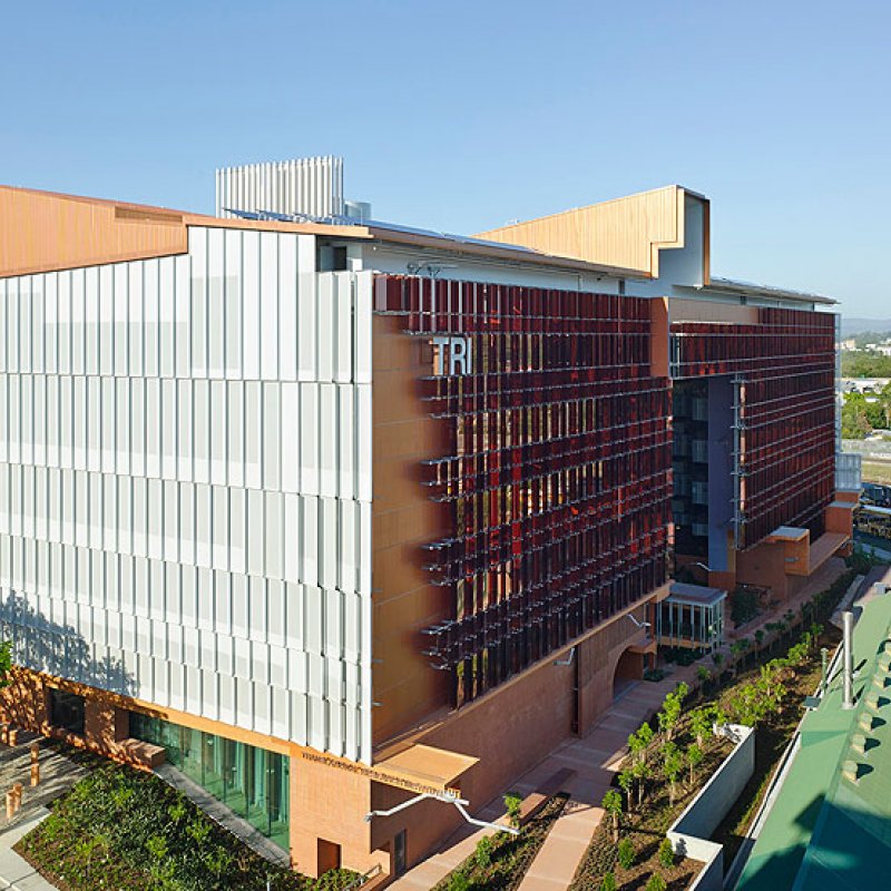 The eastern facade features a sunscreen of perforated aluminium shades clipped to the exterior with galvanised steel framing.