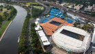 A deferential roof-line below that of Rod Laver Arena preserves the iconic form of the old