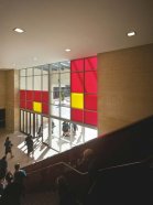 LYSAGHT SPANDEK HI-TEN® profile cladding made from ZINCALUME® steel and COLORBOND® steel comprises the lion’s share of the eastern facade of the college’s striking main entrance,