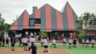 The SPANDEK® roof made from COLORBOND® steel in the colours Headland® and Monument® also nods to the home of the Essendon Football Club across the road, and creates a circus-marquee-meets-federation-grandstand aesthetic that is an ideal backdrop for a children’s playground.